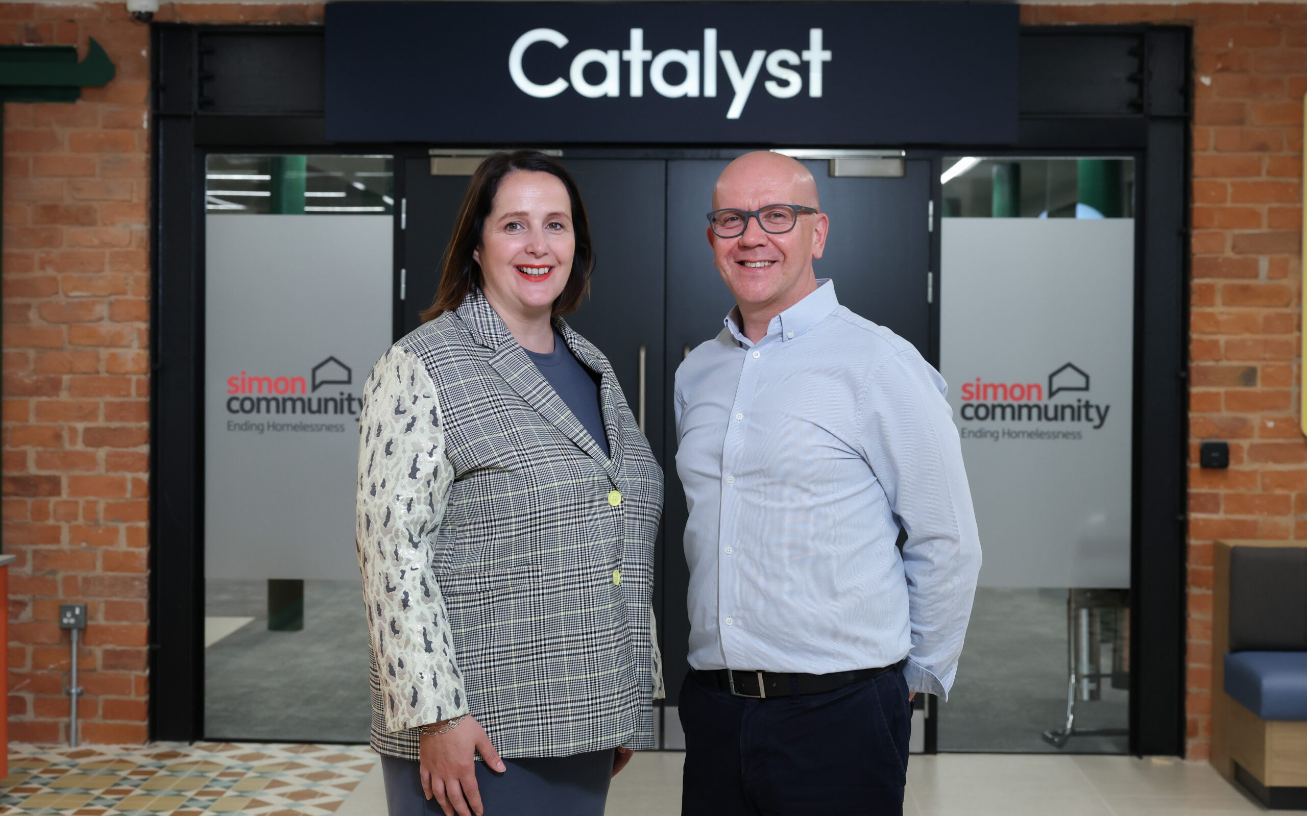 Marie Doyle Office Senior Partner for Deloitte Belfast with Jim Dennison Simon Community CEO